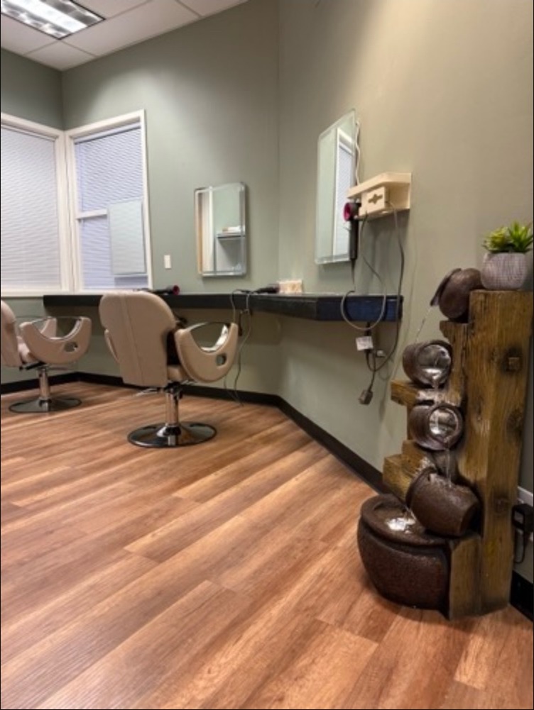 Head spa room with styling chairs and water fountain
