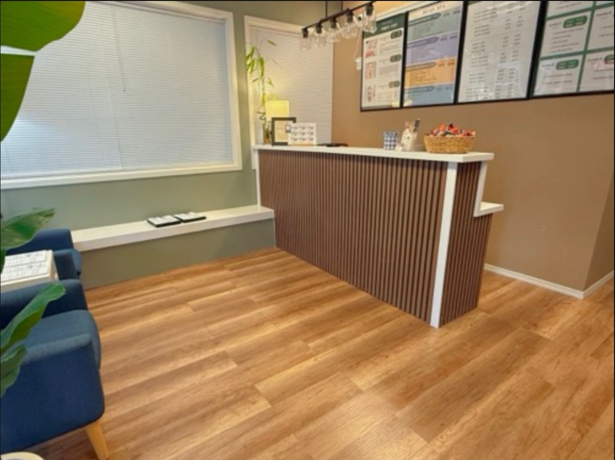 Lobby with reception desk and pricing menus